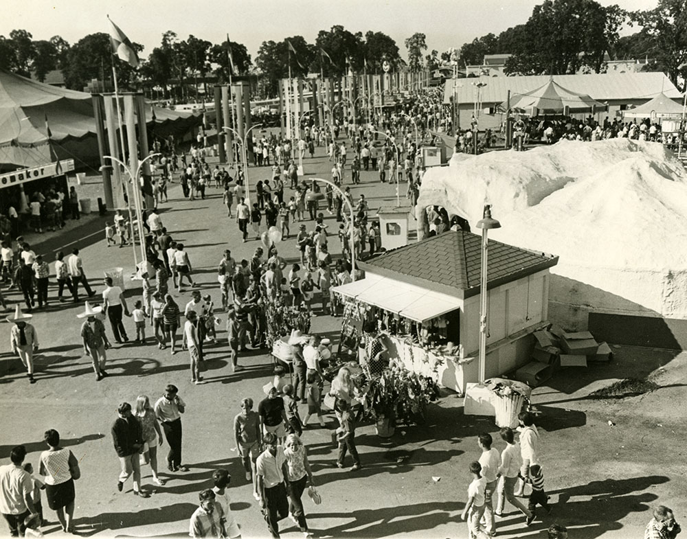 People walk through the fairway at the State Fair
