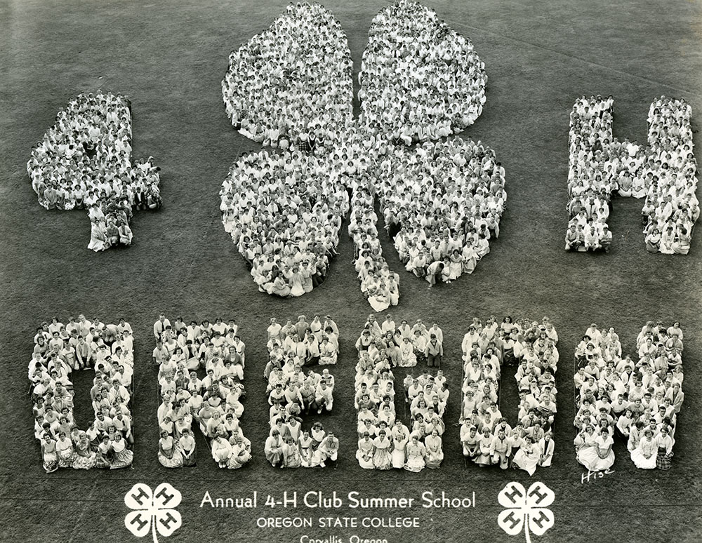 Hundreds of students form a giant 4-H logo