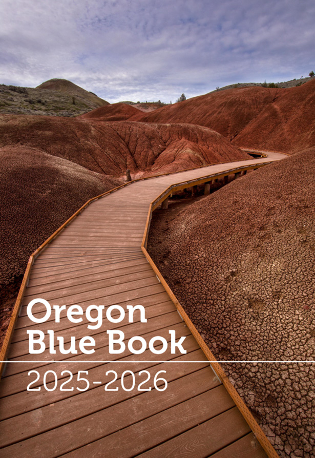 Cover of the Oregon Blue Book shows a wooden walkway in the John Day Fossil Beds
