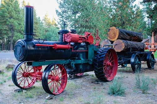 Steam tractor on the grounds outside.