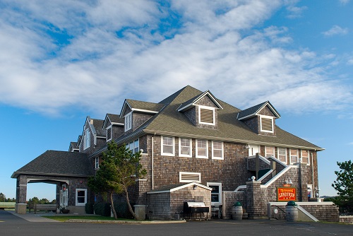 Mcmenamins Sand Trap Pub & Hotel. 18 guest rooms occupy the 3rd floor of this Cape Cod-style building.  