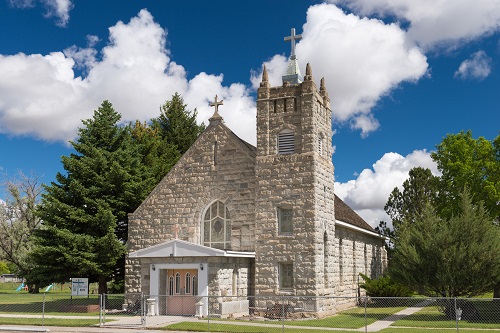 Church built from native stone in 1914. The names Fenwick, Maher, Swisher, Warn & Conners are on the top of the steeple.