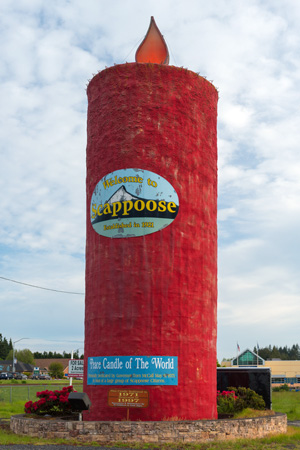An approximately 50-foot-tall tower structure 18 feet in diameter designed to look like a candle. Built in 1971.