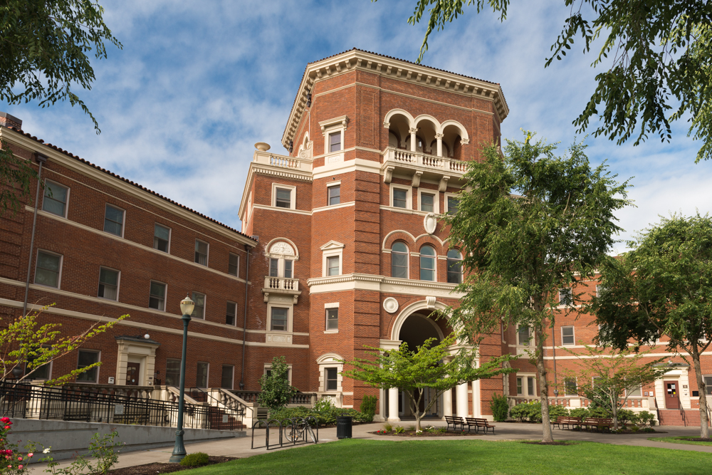 A historic five‑story red‑brick dormitory in Renaissance style