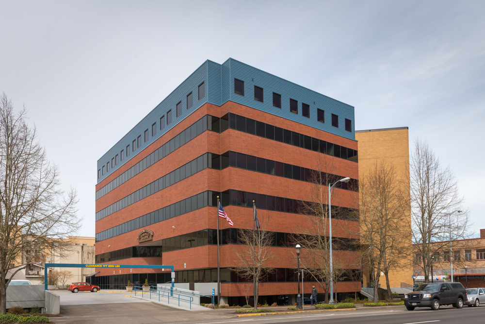 The Beardsley Building is a 77,317-square-foot Class B office property located at 201 High St SE, Salem. It has a flat roof and rows of rectangular windows.