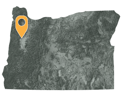 Oregon map with pointer showing location of the confederated tribes of Grand Ronde in the northwest quadrant