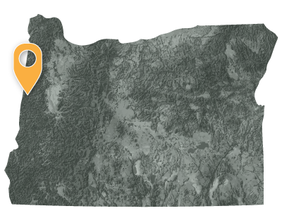 Oregon map with pointer showing location of the confederated tribes of Siletz Indians near the northwest coast.
