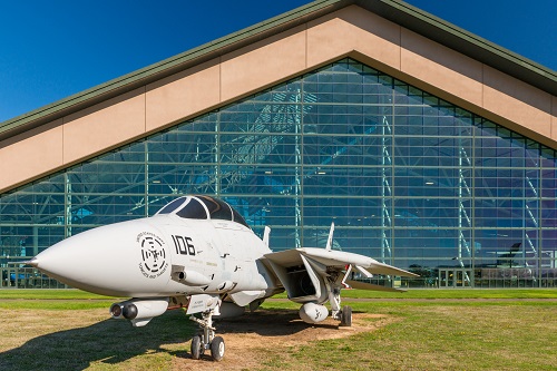 Exterior view of a vintage airplane parked outdoors at the Evergreen Aviation & Space Museum in McMinnville.