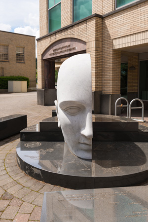 sculpture of right side of a human face
