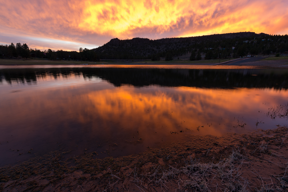 reflection of sunset on lake